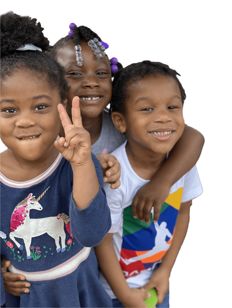 three young black children smiling and embracing - Vogel