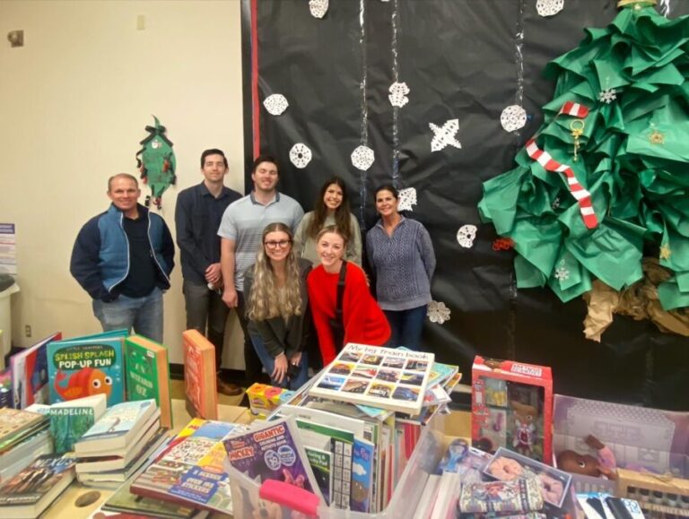 Volunteers with toys Christmas