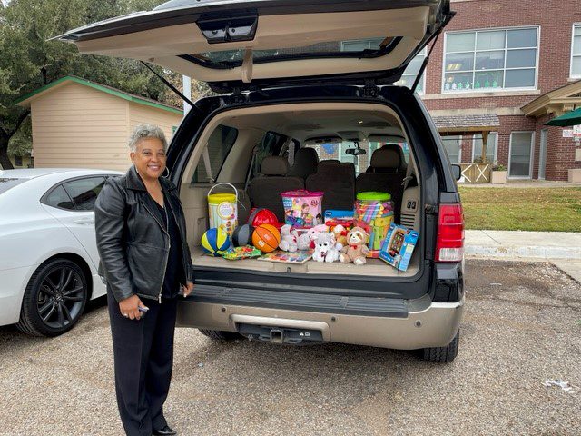 Dawn Blair with toys in trunk