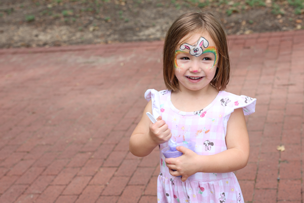 Girl posing for a photo at Vogel Family Picnic.