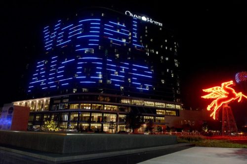 Front of the omni hotel with red pegasus